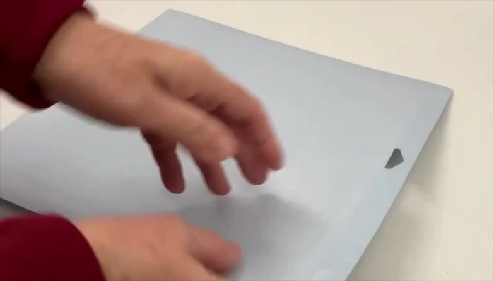 Once cutting is complete, press the 'Unload' button. Flip the mat over and gently peel the design away to prevent curling.