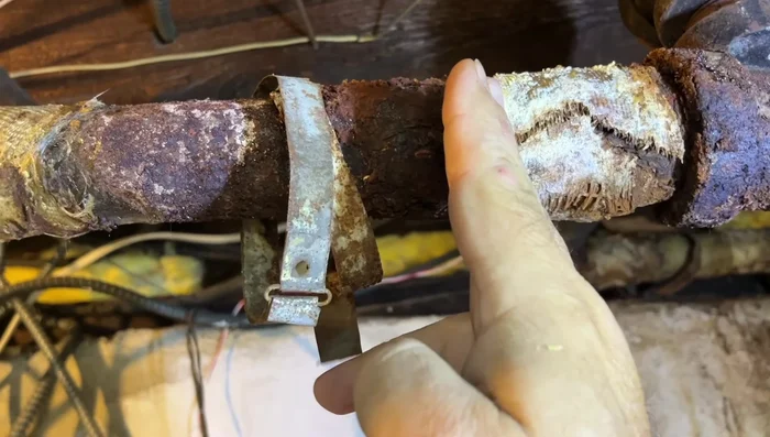 Cut the rusted pipe: Use a Sawzall to cut the rusted pipe at both joints. Be mindful of any supporting structures (like chains or straps) to prevent the pipe system from collapsing.