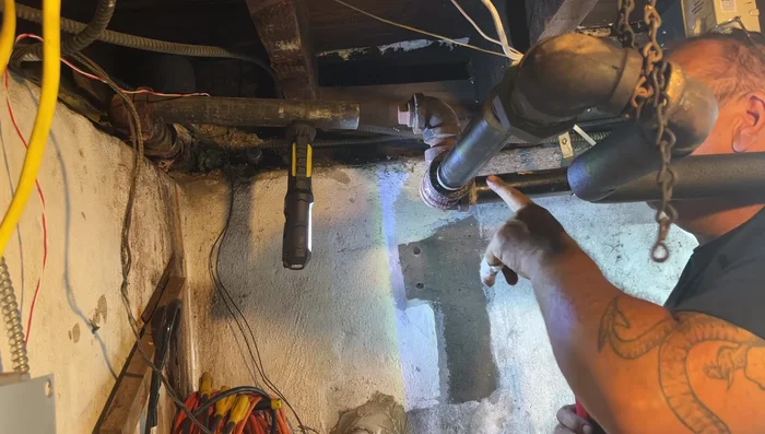 Install the replacement pipe: Apply pipe dope to the threads of the replacement pipe and screw it into the union fitting. Tighten securely.