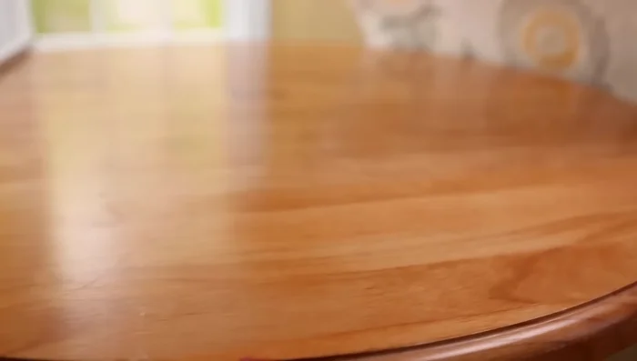 Cut a wood dowel to match window width and paint if desired.