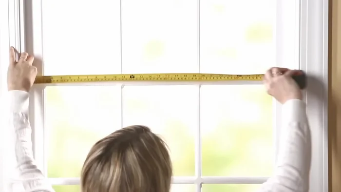 Measure window width and length. Cut fabric 2 inches wider and 3 inches longer than measurements.