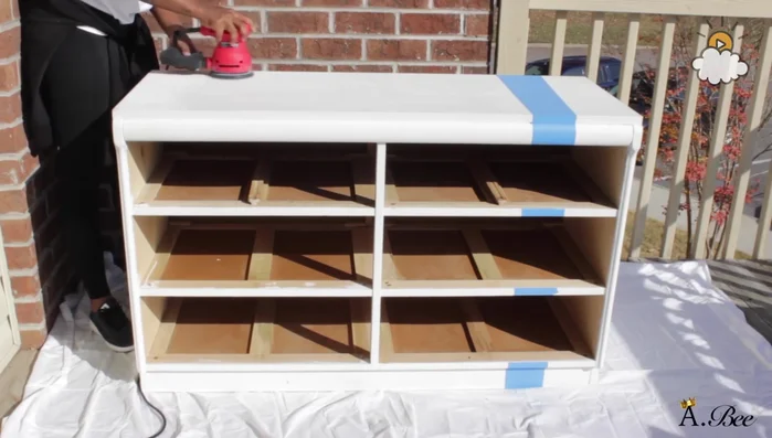 Fill any wood damage with wood putty, let it dry, and sand smooth.