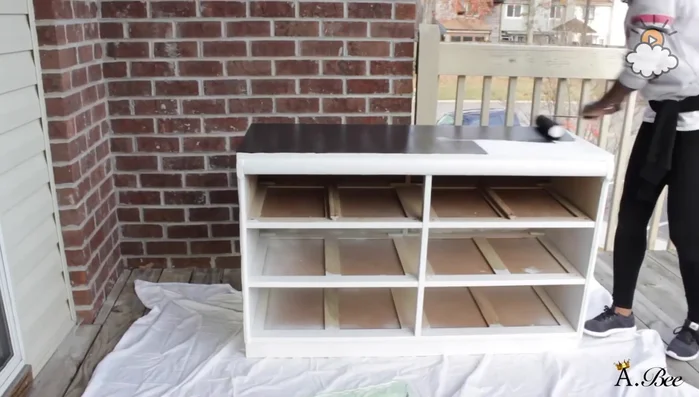 Paint the dresser with your chosen color.