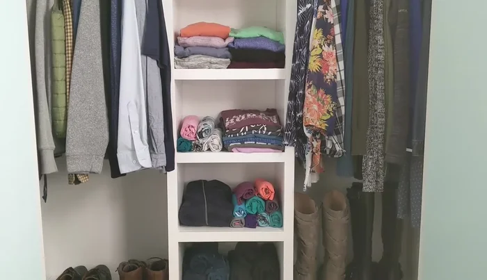 Load the closet: Organize and place clothes and shoes into the newly built closet organizer.