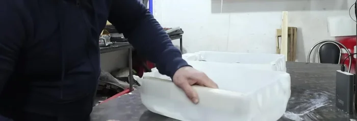 Attach the prepared planks to the container using screws.