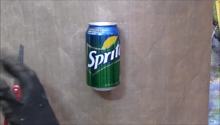 Use a 2-inch hole punch to create uniform circles from the cut aluminum.