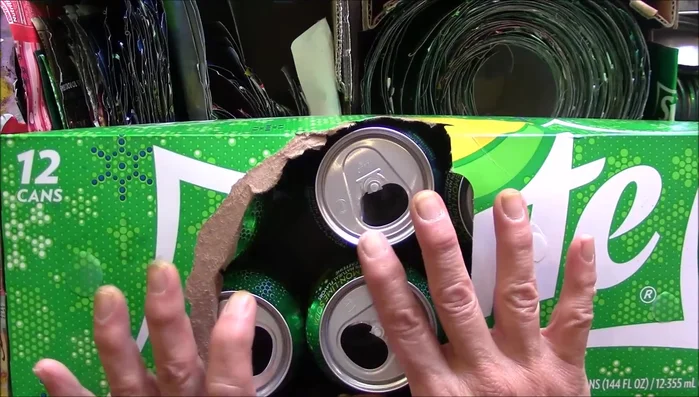 Store rinsed cans in an envelope to prevent cutting yourself and keep them straight.