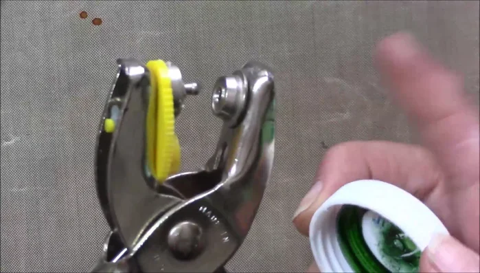 Attach the finished wind chime to a swivel hook for hanging.