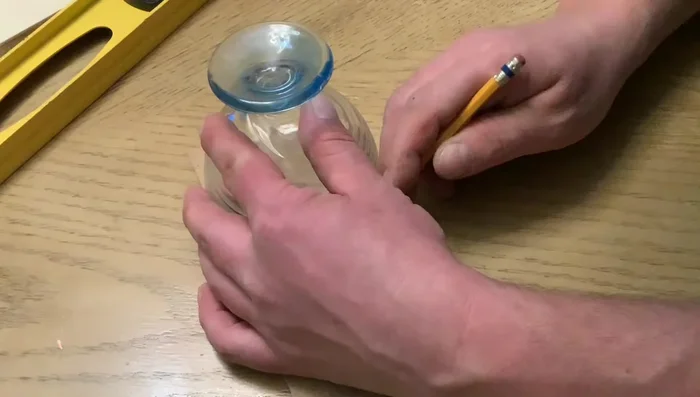 Create the scalloped edge on the 4-inch wide piece by tracing a glass or dish and cutting it out with a jig saw.