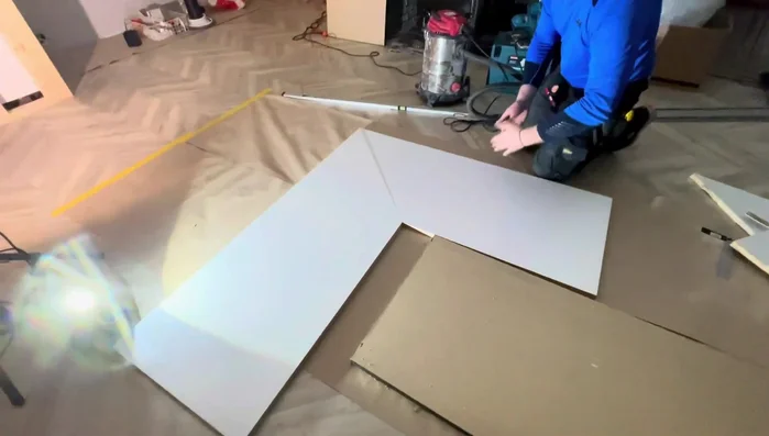 Cut the laminate flooring to size for the countertop.