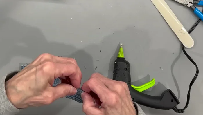 Attach the apron to the gnome's body.