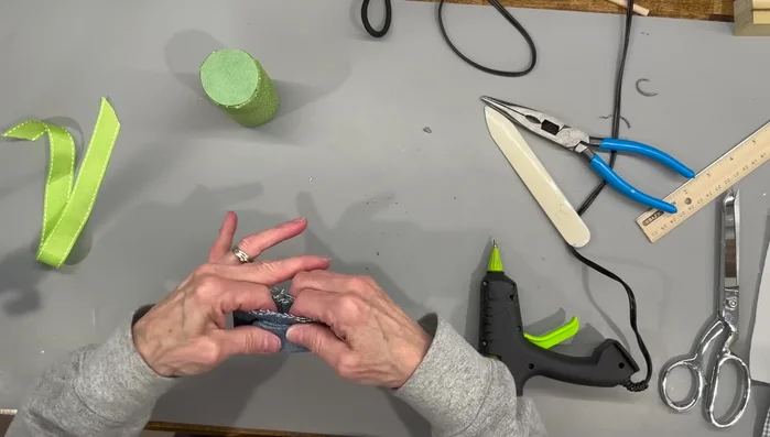 Attach the apron to the gnome's body.