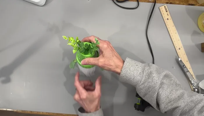 Attach the hat and nose.