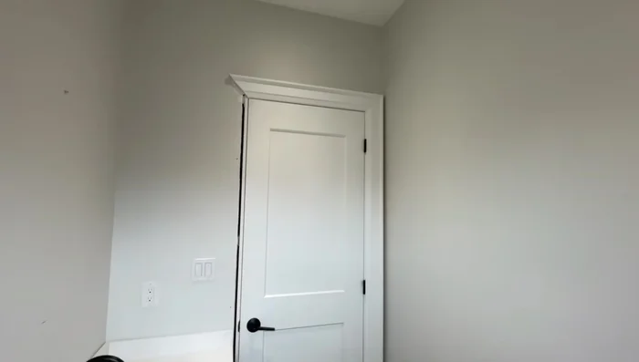 Mark the wall: Use a level to draw a vertical line on the wall to guide the placement of the first panel.