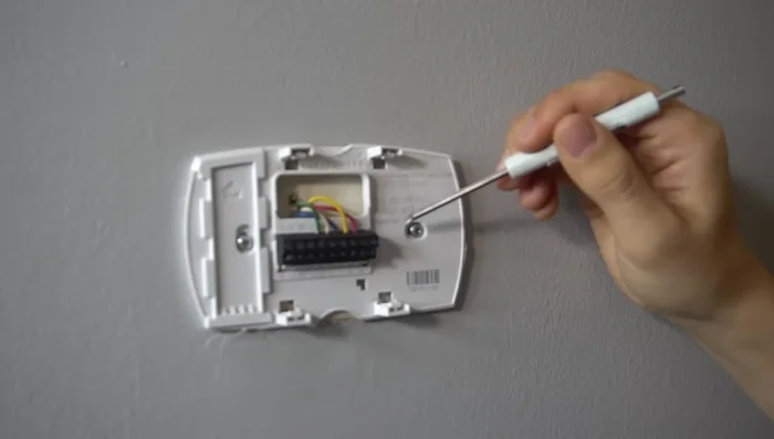 Spread the wires out to prevent them from falling back into the wall.