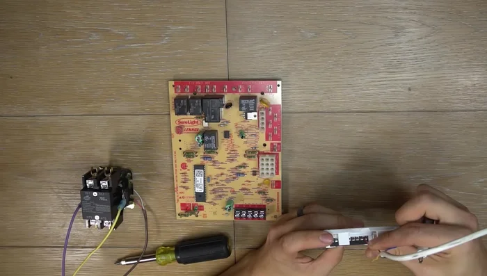 Connect the wires from the thermostat to the furnace control board, matching the terminals (R, Y, G, W, C).