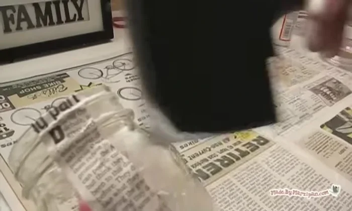 Add a sealing coat of Mod Podge over the newspaper, smoothing down any uneven areas. Set aside to dry.