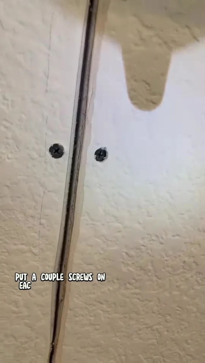Secure the drywall: Screw into the studs on either side of the crack to stabilize the drywall and prevent further cracking.
