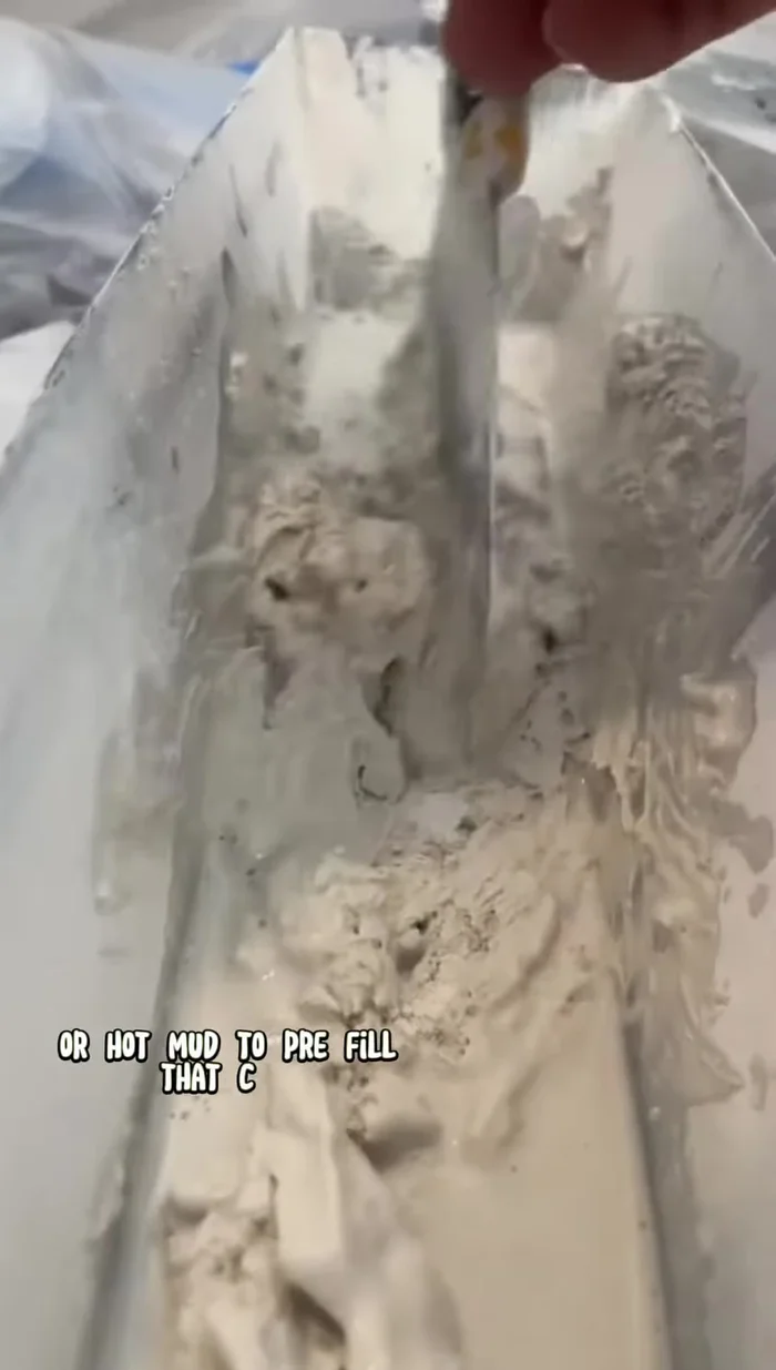 Reinforce with tape: Apply fiber fuse tape (or mesh tape) over the pre-filled crack for added strength and to prevent future cracking. This is a crucial step.