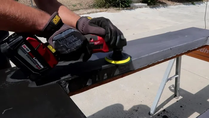 Polish the concrete top using an angle grinder and polishing set.