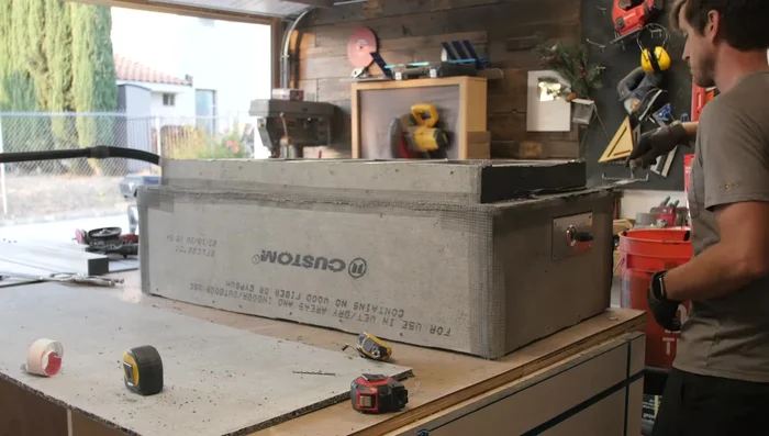 Apply a wet look sealer to the base.