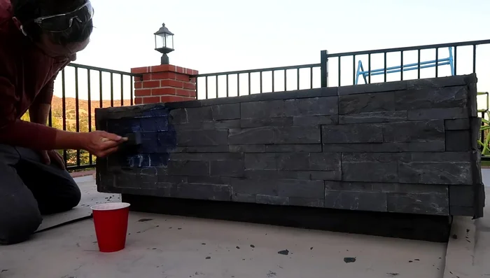 Apply a wet look sealer to the base.