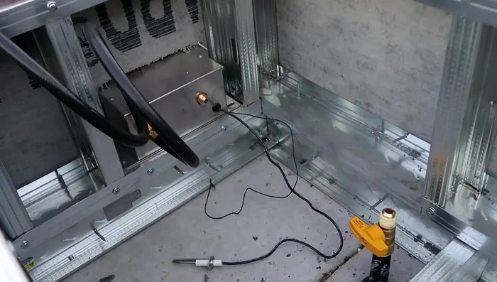 Turn on the gas, fill the fire tray with fire glass, and light the fire pit.