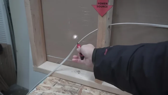 Turn off the power at the circuit breaker and double-check with a voltage detector.