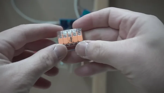 Connect ground wires: Connect all ground wires (from the switches, light fixtures, and power source) together using a multi-wire connector.