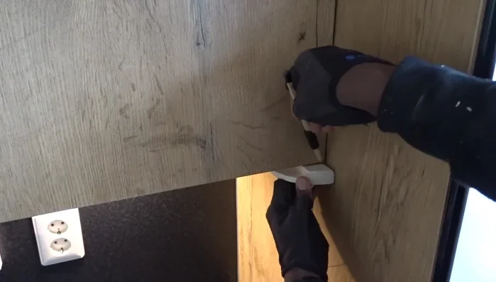 Adjust the length of the pieces to fit the space under the cabinets.