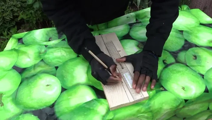 Use a bandsaw to cut along the traced lines to create the circle.