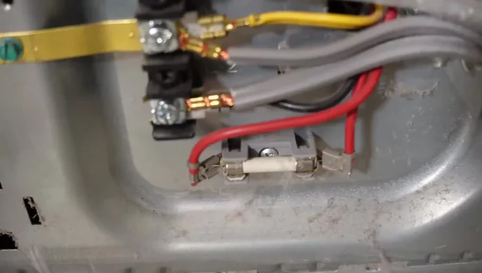 Check the fuse: Locate the fuse at the bottom of the housing and test its continuity with a multimeter.