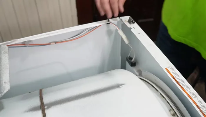 Test the door switch (visual inspection and multimeter continuity test).