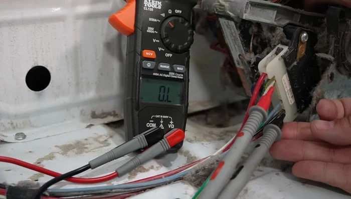 Test the dryer motor (ohm resistance test and centrifugal switch test).