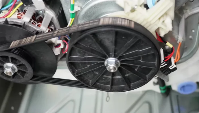 Check for excessive play in the pulleys.