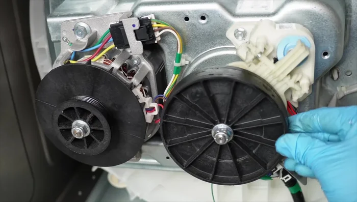 Check for excessive play in the pulleys.