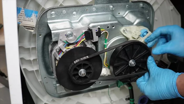 Reinstall the belt and belt cover.