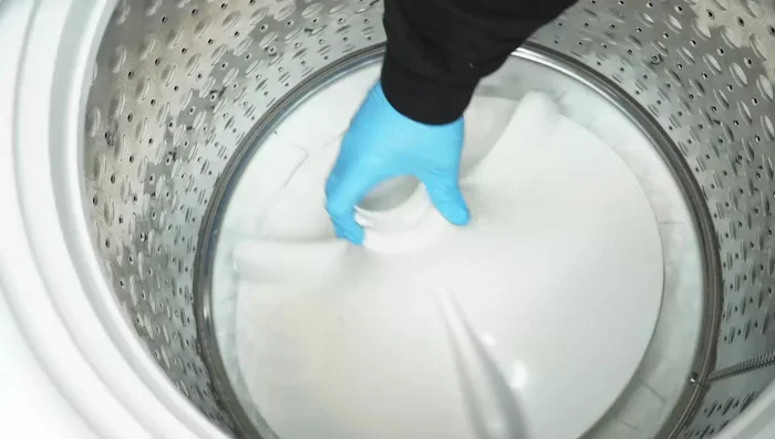 Reinstall the agitator.