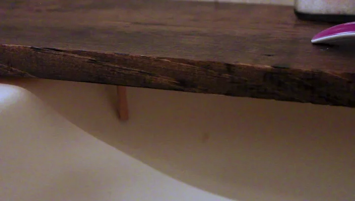 Stain the dowels to match the board.