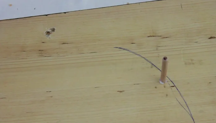 Stain the dowels to match the board.