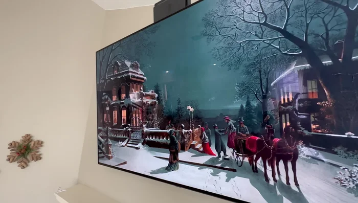 Hang stockings and add a wooden garland and a gold bell garland to the mantel.