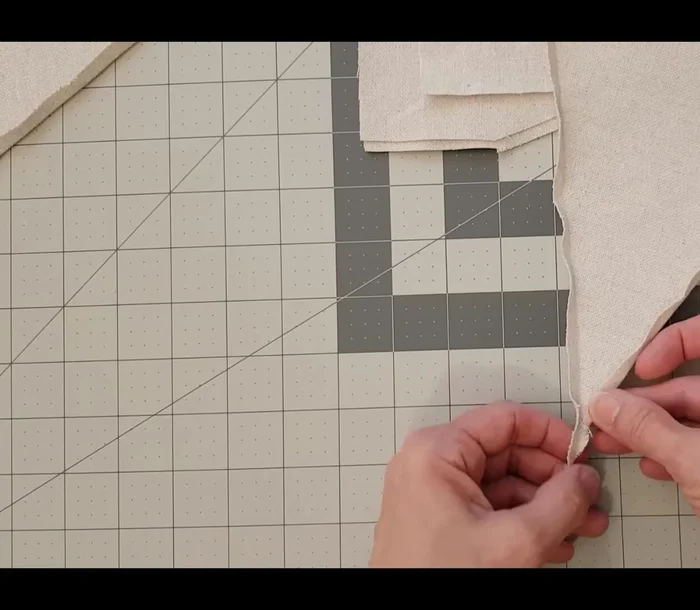 Sew or glue the seam allowance. A zigzag stitch (6.5 mm width) is recommended if sewing. Alternatively, use fabric glue, Mod Podge, or double-sided tape.