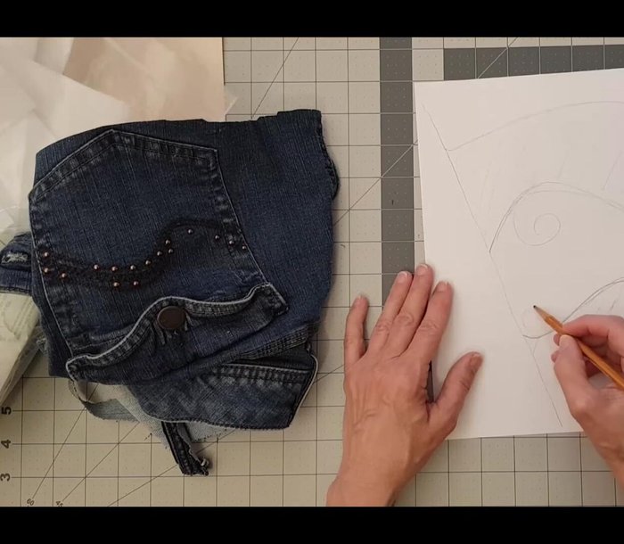 Arrange all fabric pieces before fusing to allow adjustments.