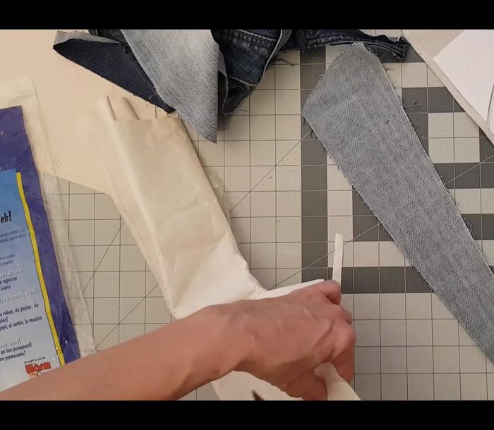 Arrange all fabric pieces before fusing to allow adjustments.