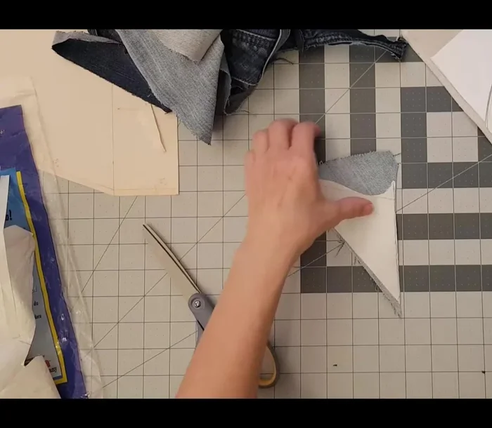 Arrange all fabric pieces before fusing to allow adjustments.