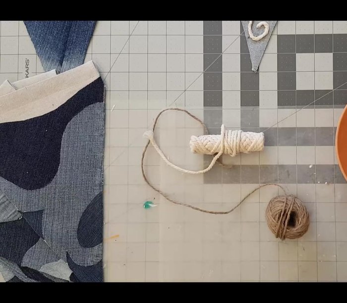 Use matte Mod Podge to glue down the decorative elements. For stiff elements, pre-soak in glue-water mixture.