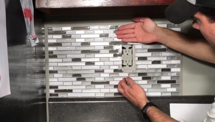 Repeat steps 6-8 for outlets, corners, and other areas requiring precise cuts. For outlets, it's easier to lay the tile and then cut down from the top, rather than attempting to cut a hole in advance.