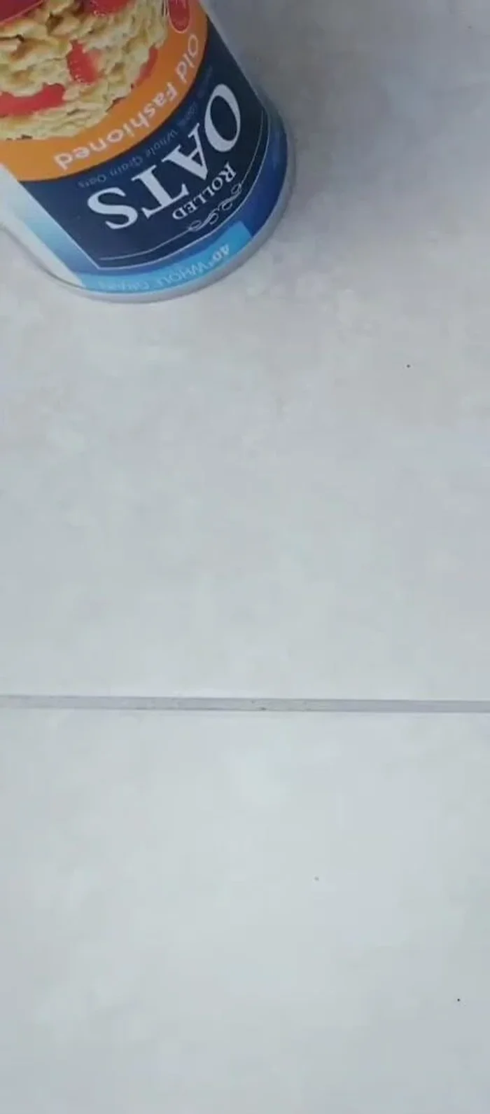 Cut off excess lid material with an Exacto knife.