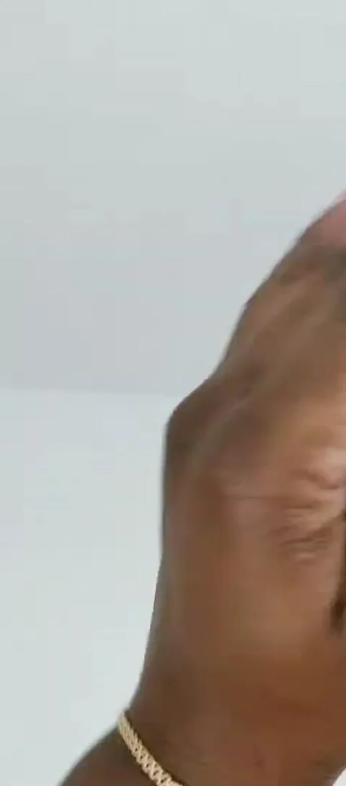 Glue a smaller mirror to the top of the lid and fill in the gaps with pebbles.