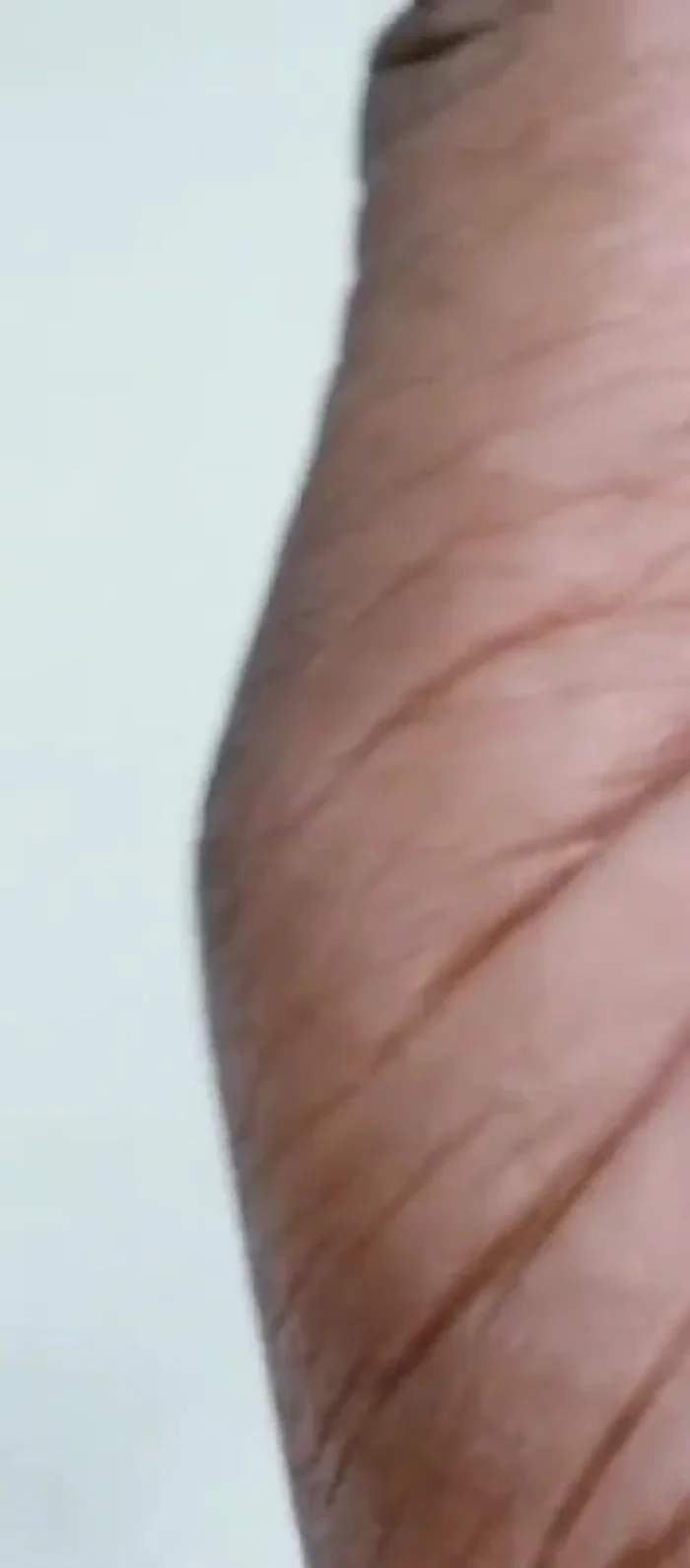 Attach the handles to the mirror using construction adhesive.